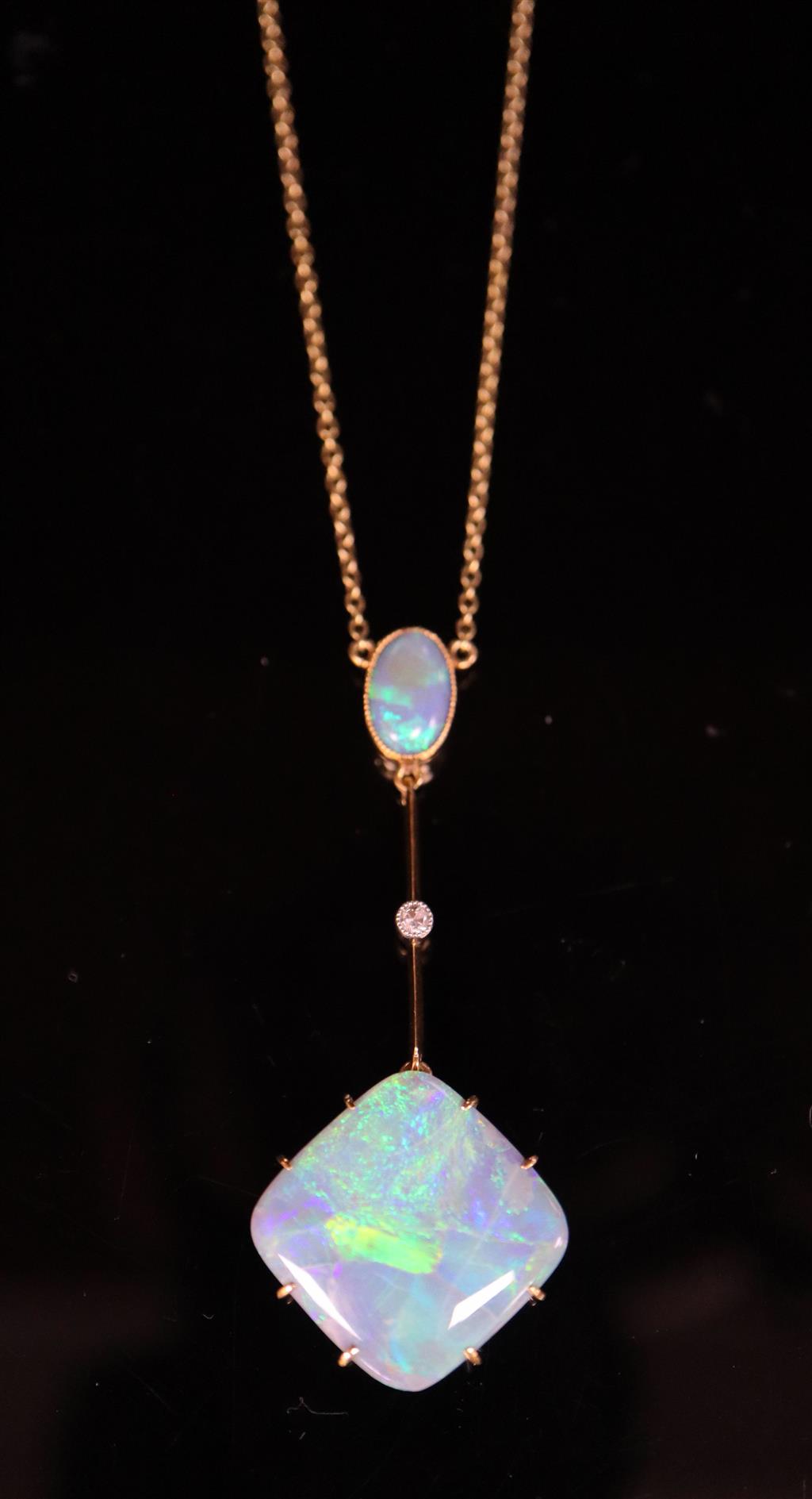 An early 20th century 15ct gold, diamond and two stone opal set drop pendant necklace,